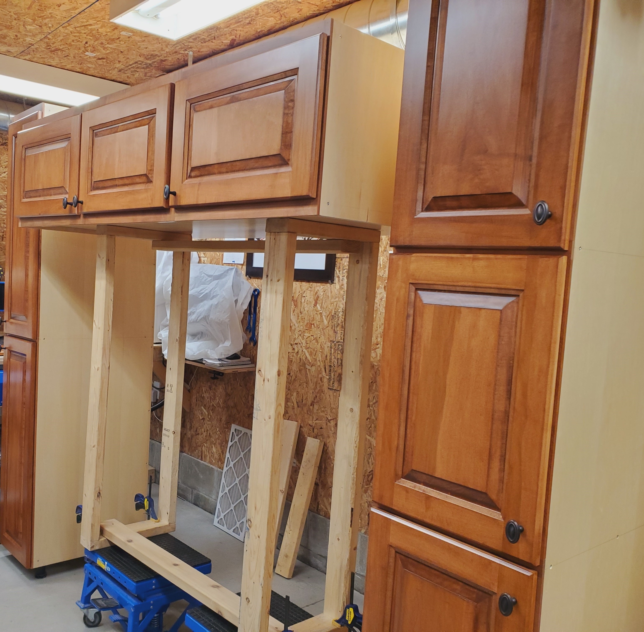 Custom pre-assembly (often called rigid assembly) involves building kitchen cabinet boxes in a controlled factory environment before they arrive at your home. This process ensures the cabinets are sturdy, square, and ready for immediate placement.