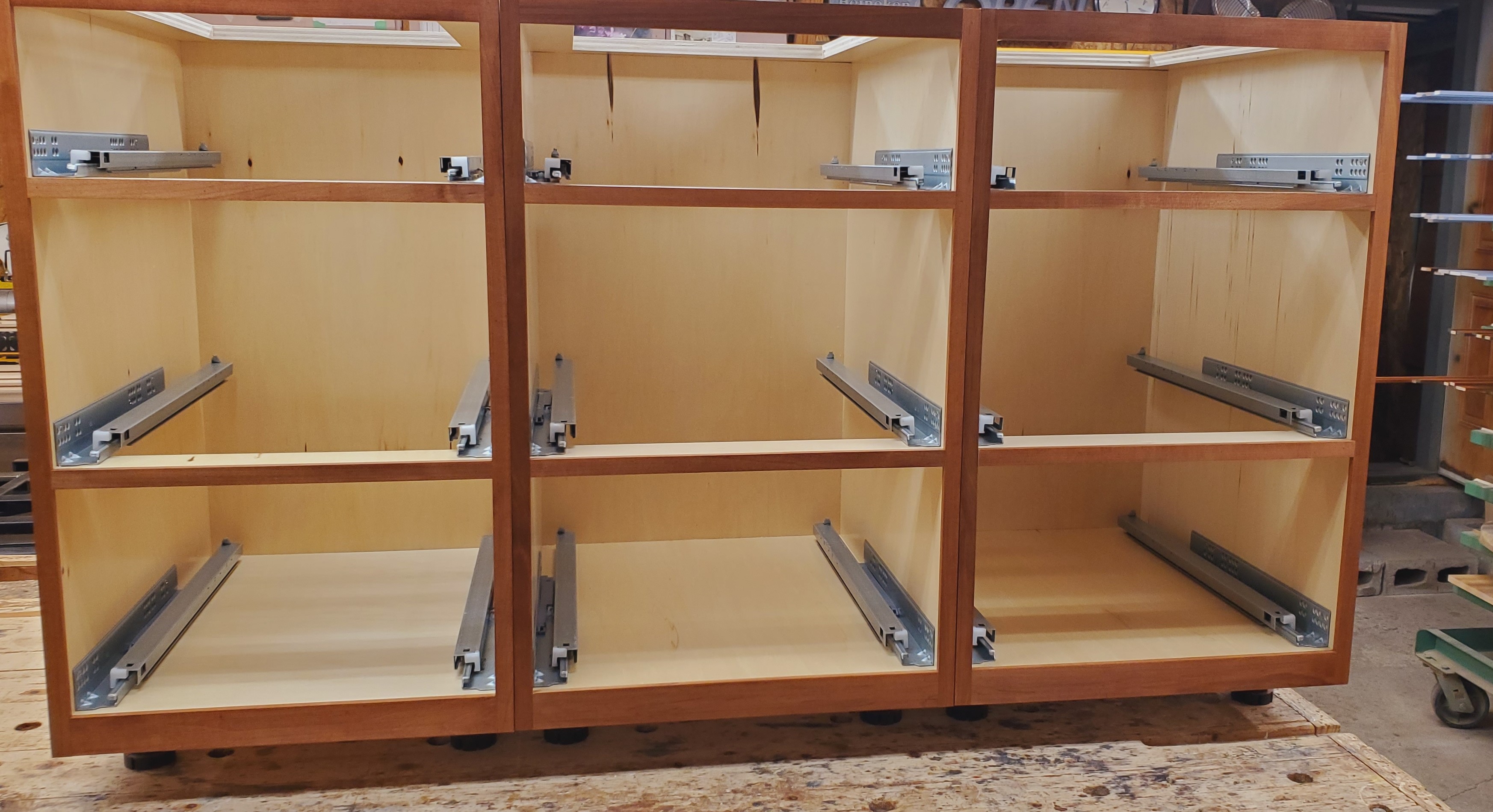 base cabinet construction with tandem soft-close slides